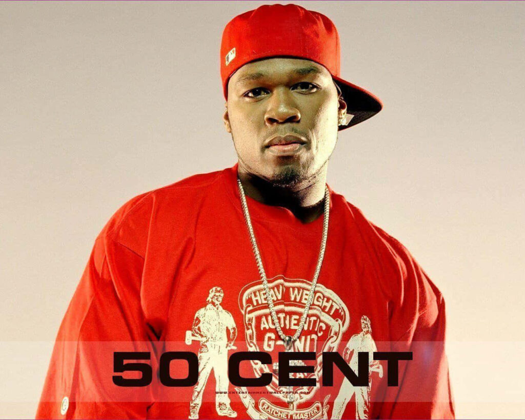 Award-winning rapper 50 Cent in bold red outfit and cap showcasing iconic hip-hop style wallpaper