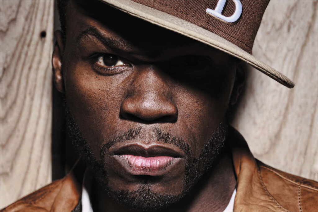 50 Cent close-up wallpaper showing confident intense rapper with bold larger-than-life attitude