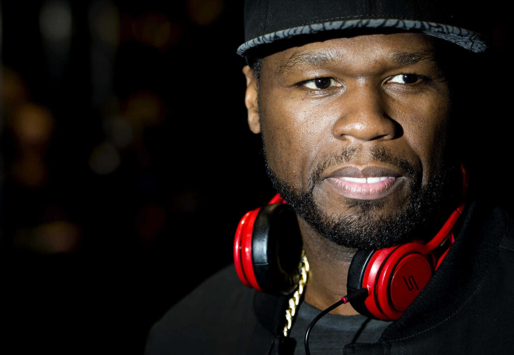 50 Cent hip hop rapper wearing black cap red headphones confident music industry wallpaper