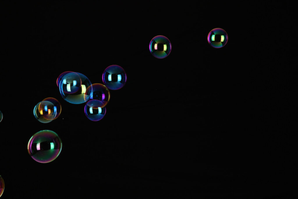 Bubble Bliss: Stunning Black Tablet Wallpaper of Floating Bubbles