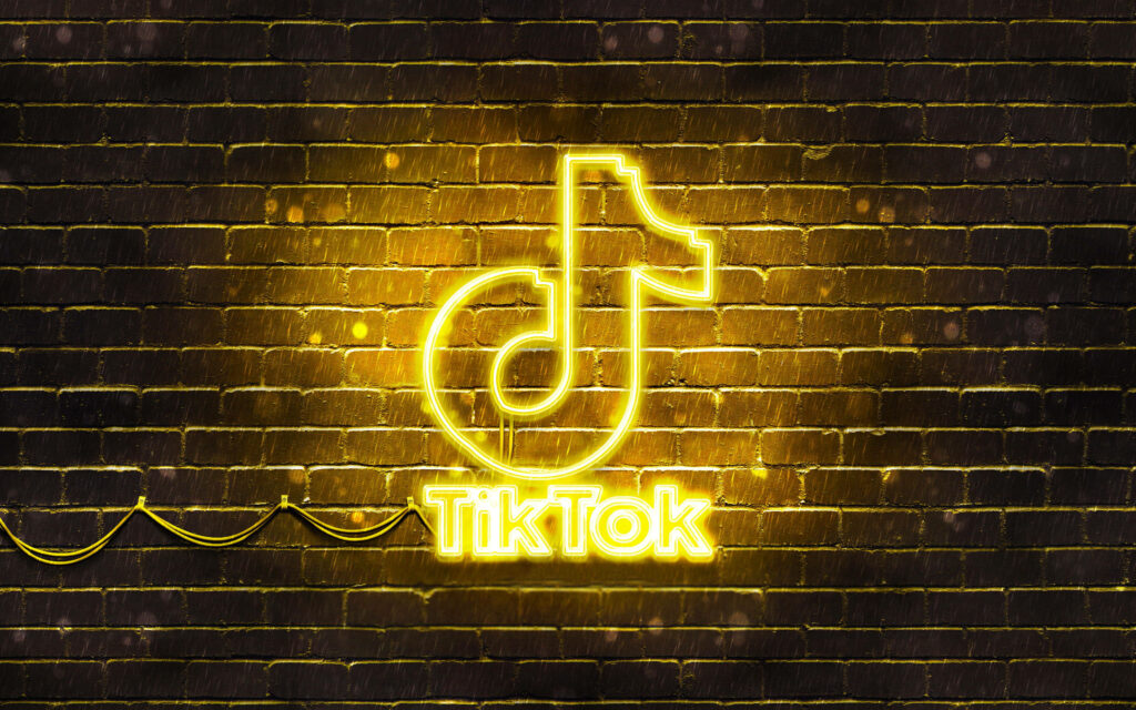 Yellow Bricked TikTok: Be A Bright Star In Your Social Media Journey with This Wallpaper
