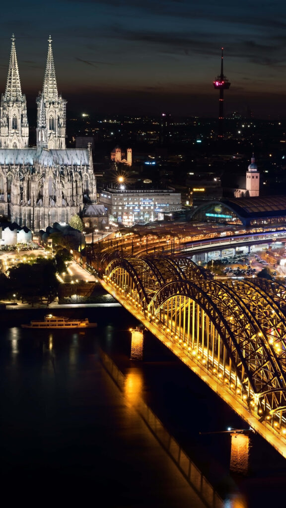 Majestic Night View of Cologne Cathedral and Hohenzollern Bridge: HD Phone Wallpaper