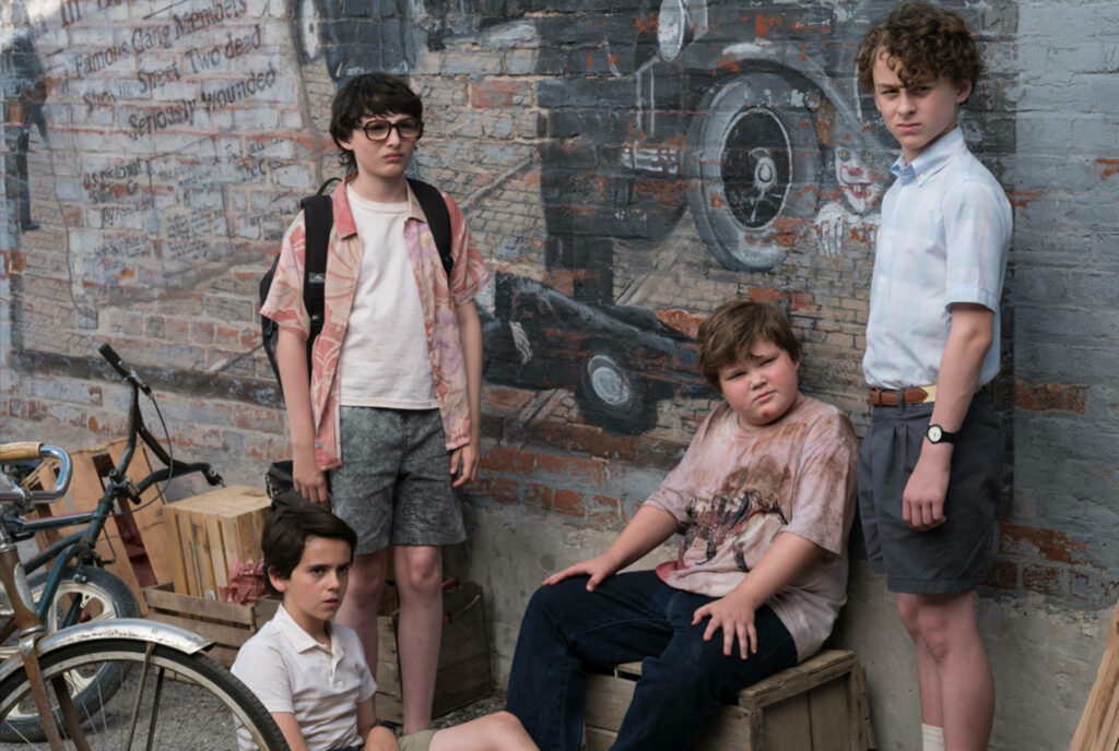 The Losers' Club Convenes in the Eerie Alleyway - A Thrilling Wallpaper Scene from Stephen King's IT!