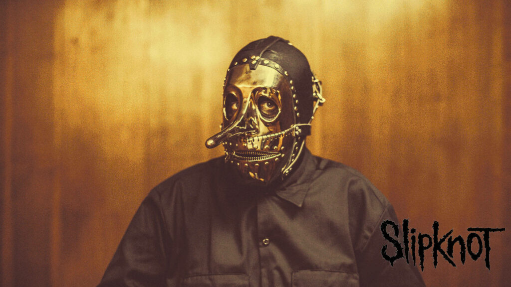 Golden Masked Maverick: Slipknot's Chris in Epic Wallpaper Design