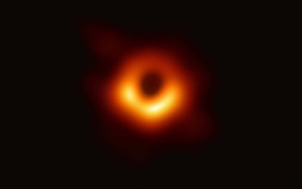 Gazing into the Celestial Abyss: A Captivating Portrait of the Enigmatic Black Hole Sun Wallpaper