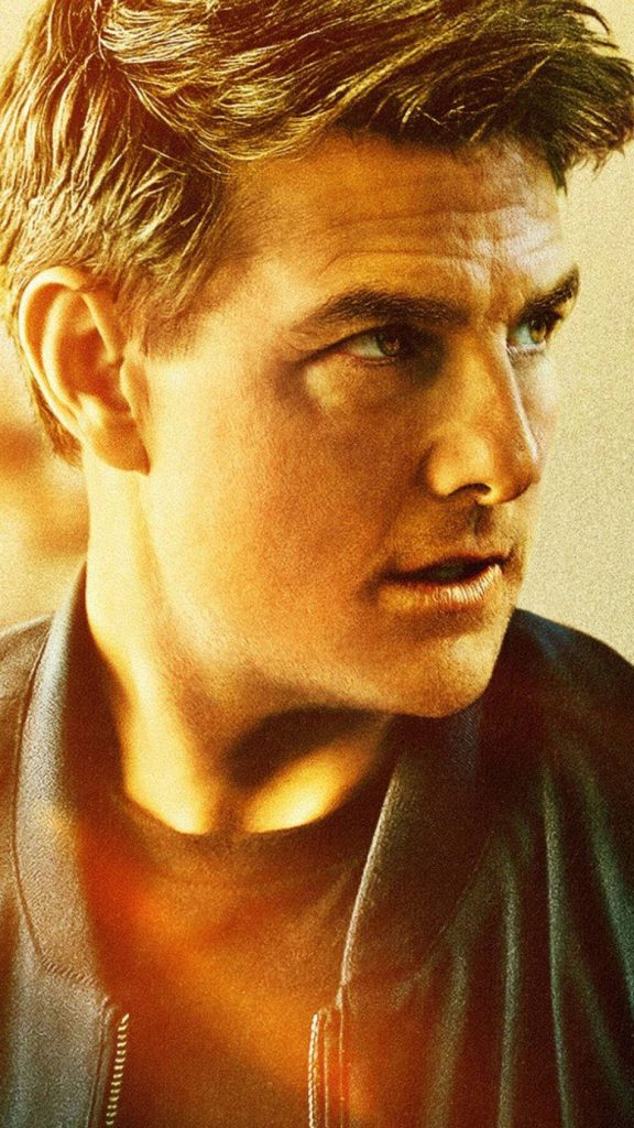 Tom Cruise intense close-up portrait wallpaper warm golden light Mission Impossible fan background