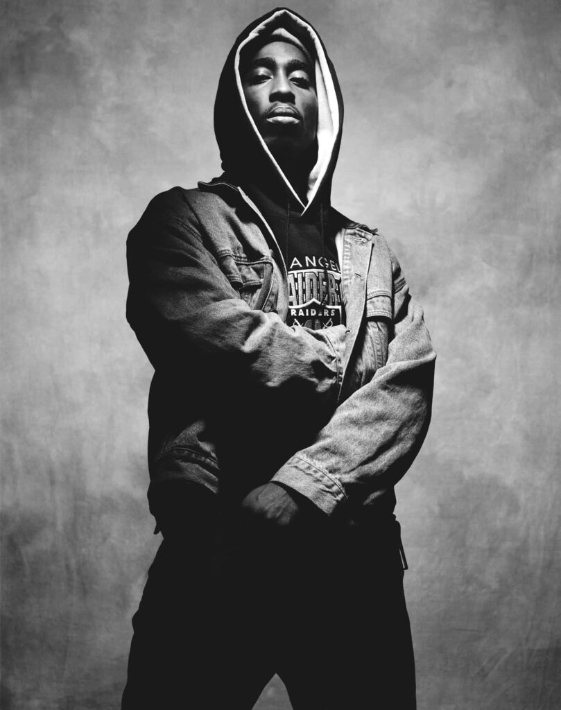 Iconic Reflections: Tupac Shakur, the Visionary who Transcended Time Wallpaper