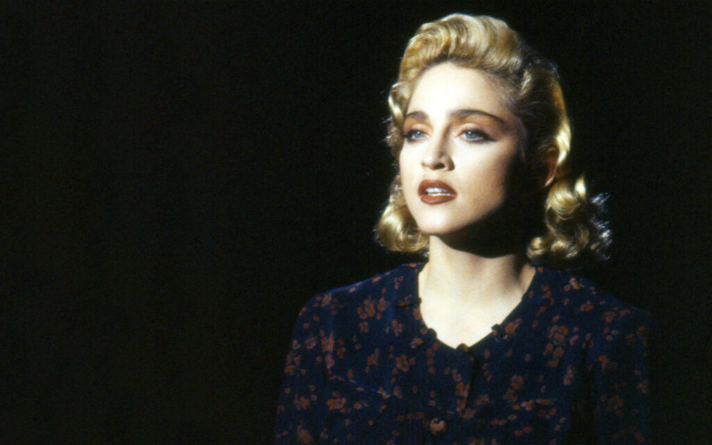 Timeless 90s Madonna Wallpaper: Retro Style & Elegance Background
