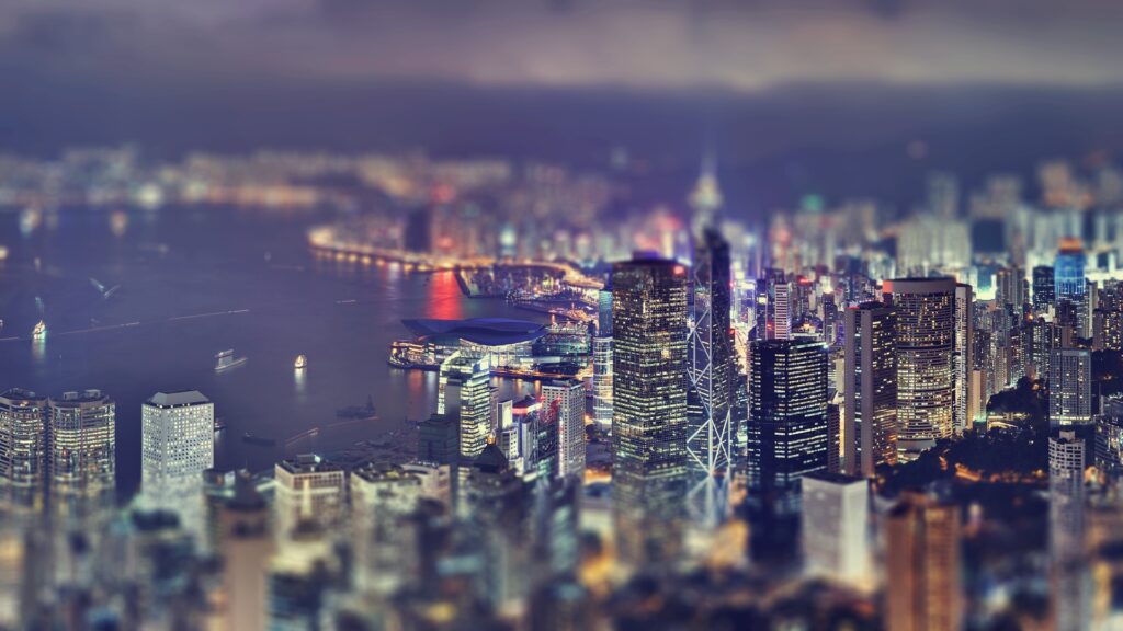 Elevated Serenity: A Tilt Shift HD Wallpaper of Skyscraper Evening in Aerial City Background Photo