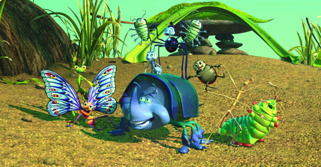A Bugs Life wallpaper showing main insect characters teamwork in vibrant outdoor scene