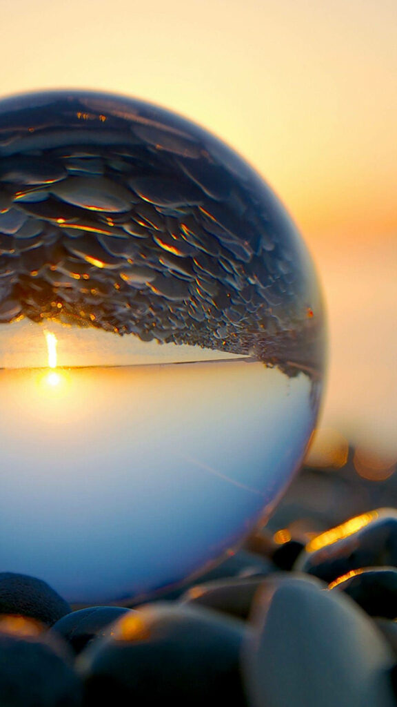 Crystal Clear Sunset Reflection: Mesmerizing HD Phone Background Wallpaper