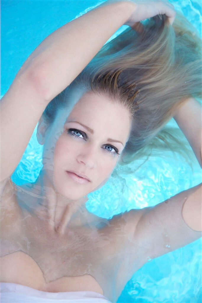 A J Cook underwater portrait serene expression flowing hair elegant wallpaper background