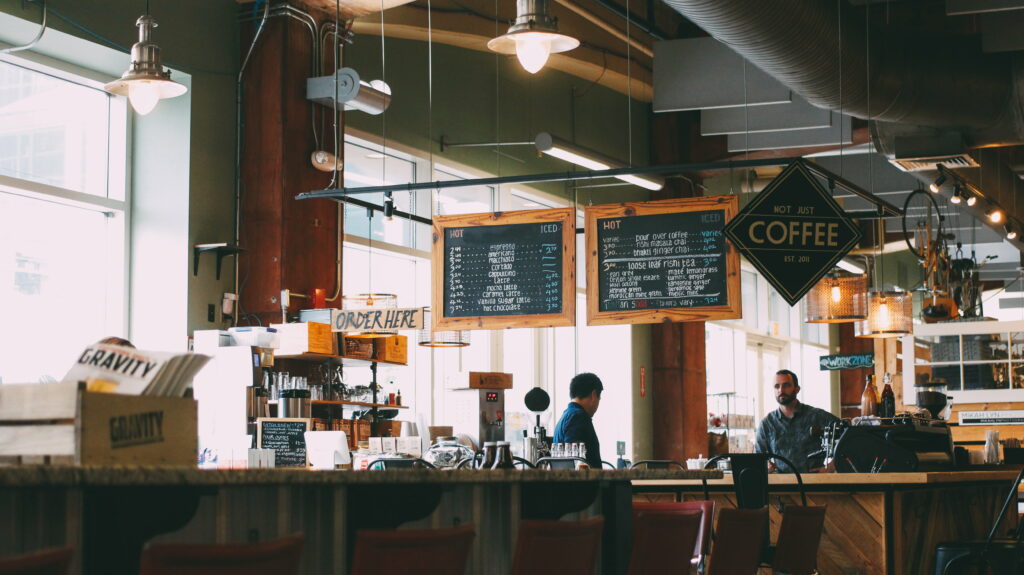 Urban Chill: A Serene Encounter at the Cafe Wallpaper