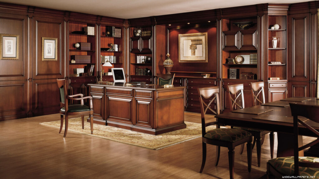 Luxurious home office with dark mahogany wood paneling grand desk and built-in bookshelves Wallpaper