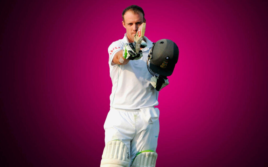 AB de Villiers confident in cricket gear vibrant pink background legendary cricketer wallpaper