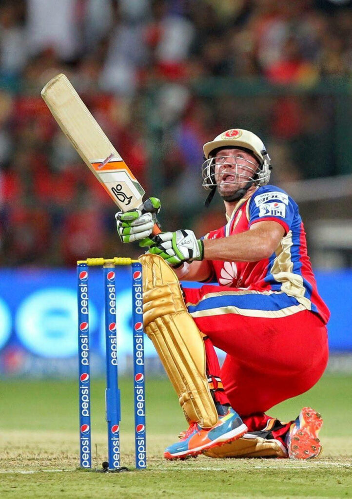AB de Villiers hitting powerful shot cricket match action vibrant dynamic wallpaper background
