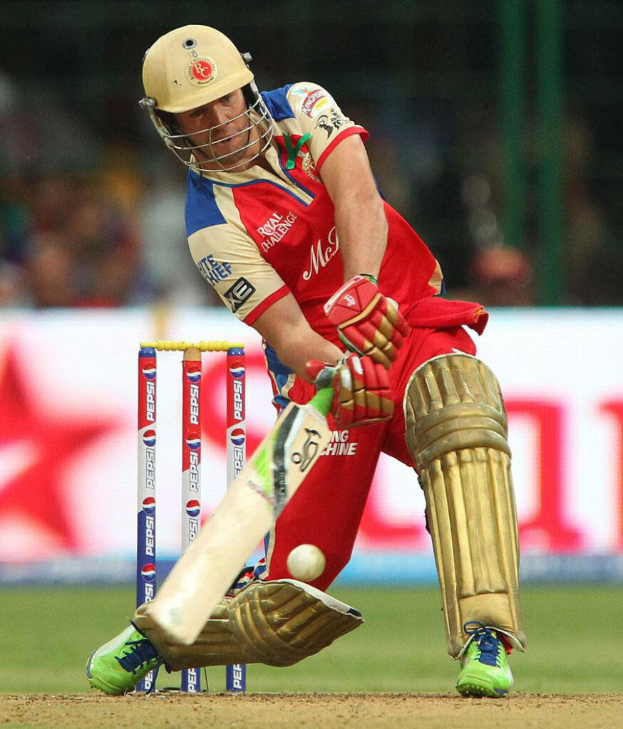 AB de Villiers powerful batting stance mid-shot for RCB intense cricket match wallpaper background