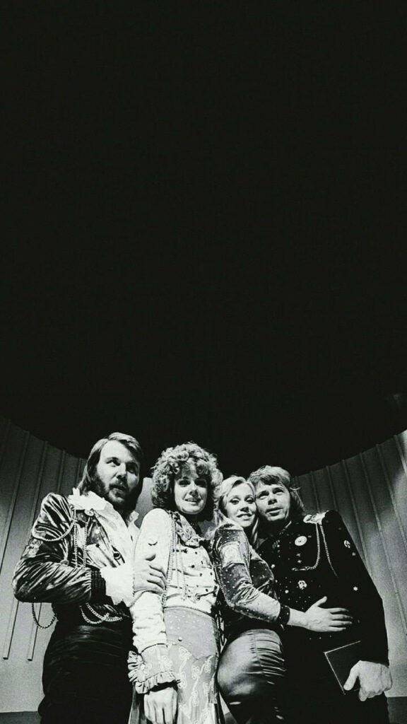 Black and white ABBA wallpaper vintage outfits iconic music group timeless classic background