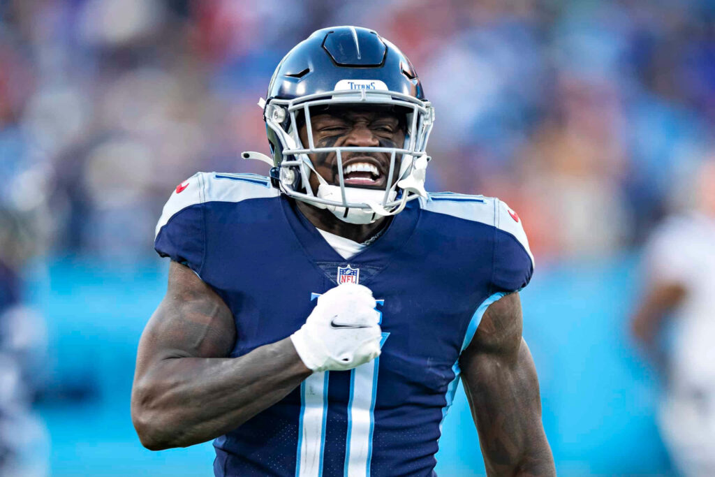 A J Brown celebrating with intense chest thump football wallpaper showcasing energy