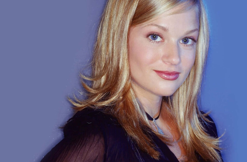 AJ Cook elegant confident portrait radiant beauty soft blue wallpaper background image