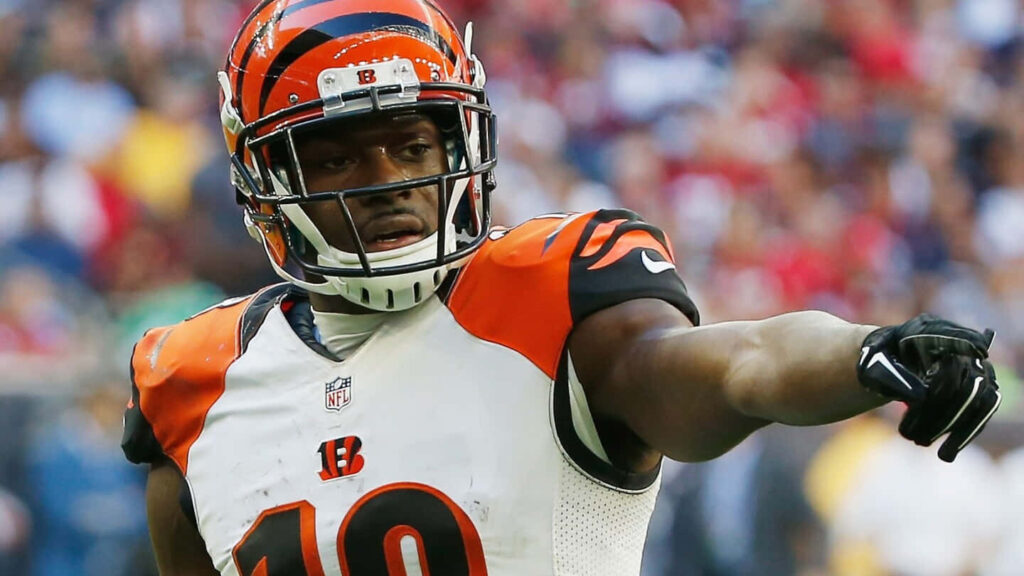 A.J. Green Cincinnati Bengals football player directing teammates on field dynamic action scene Wallpaper