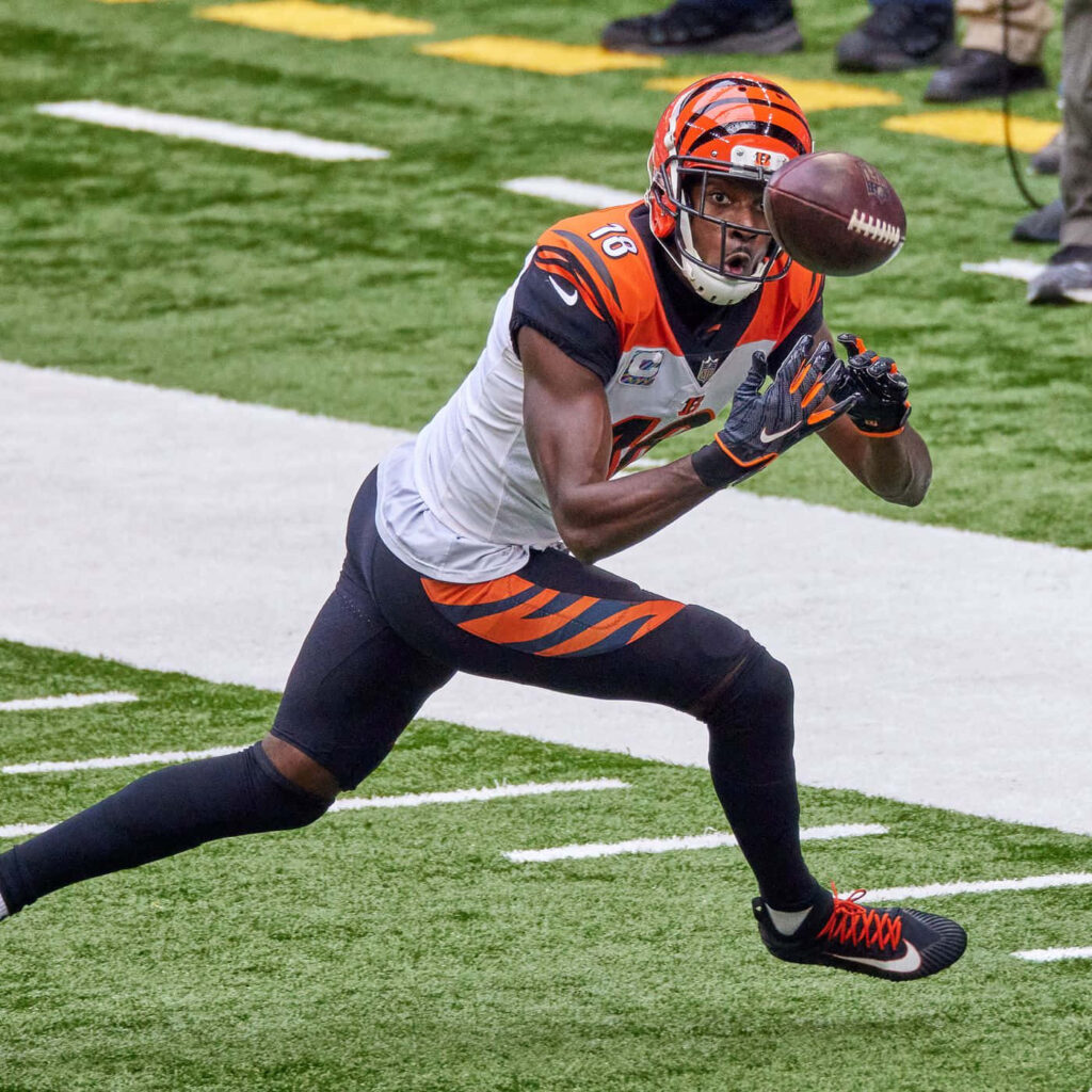 A.J. Green focused reaching to catch football NFL receiver elite skills dynamic game wallpaper
