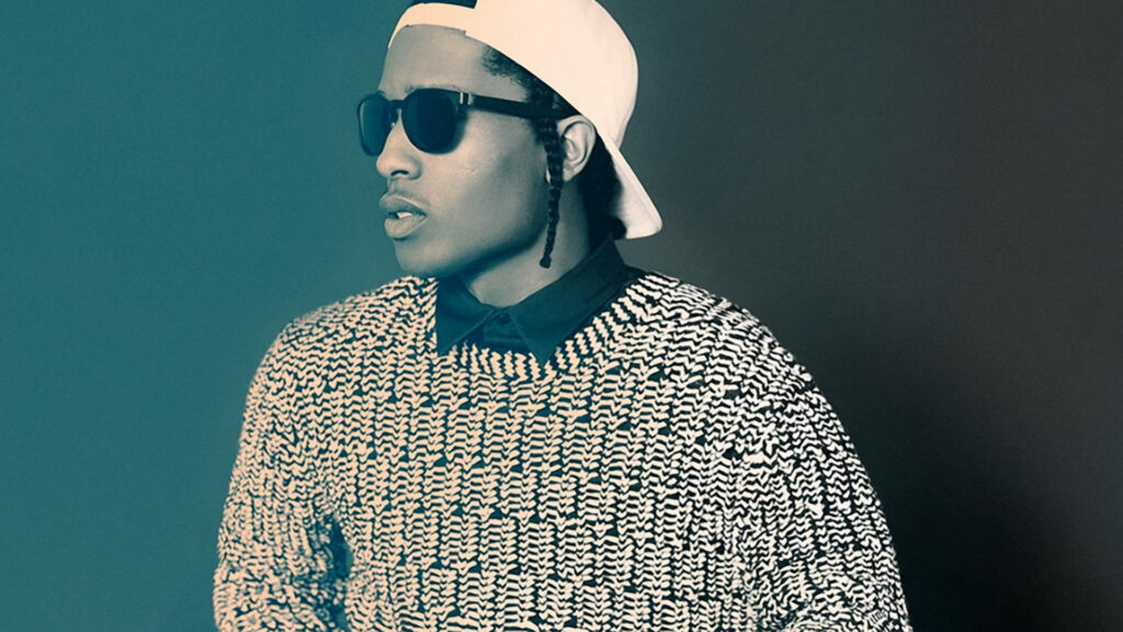 ASAP Rocky in white cap dark sunglasses patterned sweater stylish modern wallpaper background