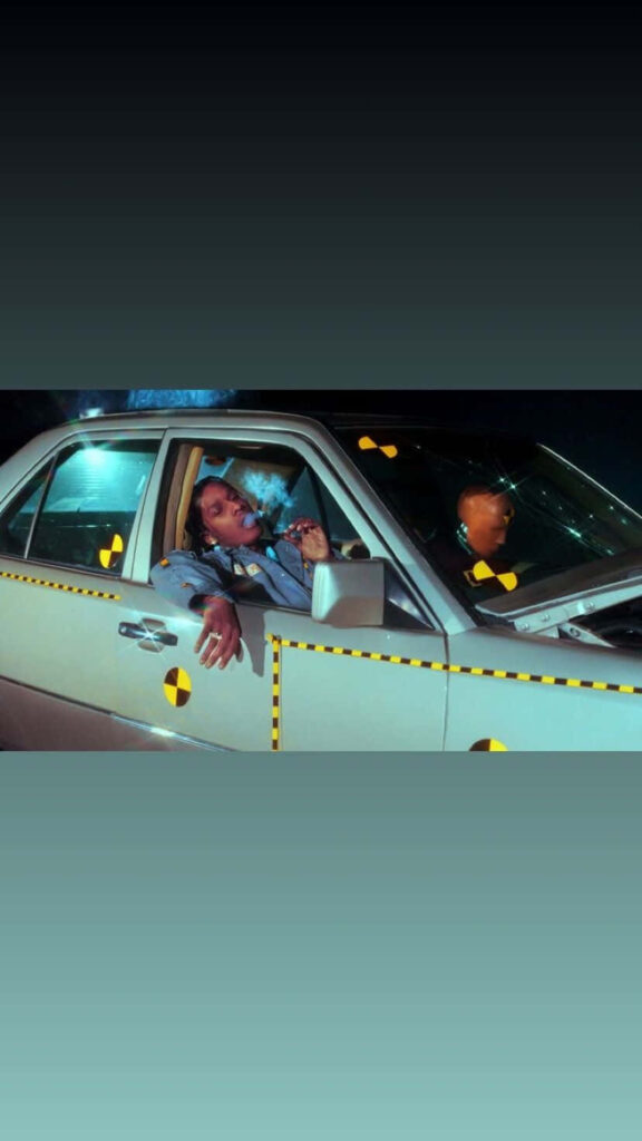 A$AP Rocky inside car with crash test dummy markings inspired by Testing album aesthetic wallpaper