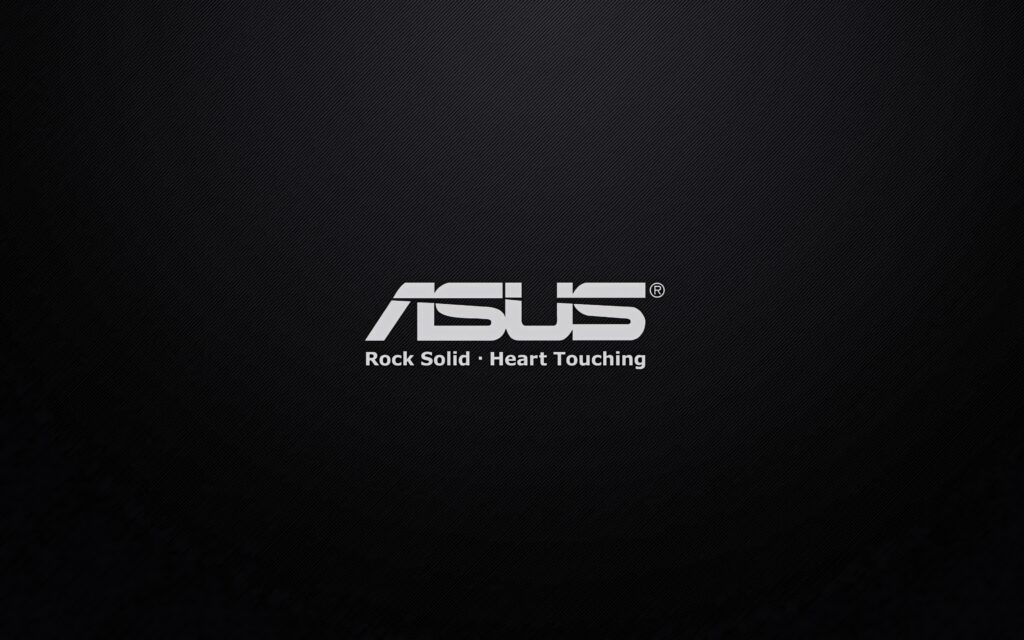 ASUS logo with Rock Solid Heart Touching slogan on sleek textured black professional wallpaper background