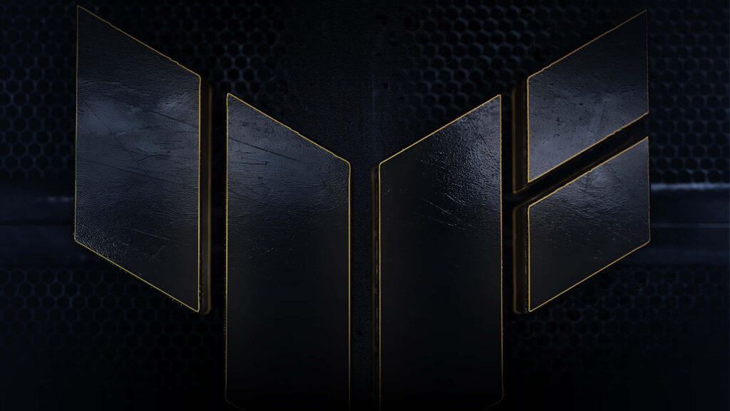 ASUS TUF Gaming logo with rugged metallic texture on dark industrial background wallpaper