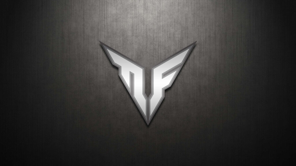 ASUS TUF Gaming logo metallic design on textured dark background gaming wallpaper background