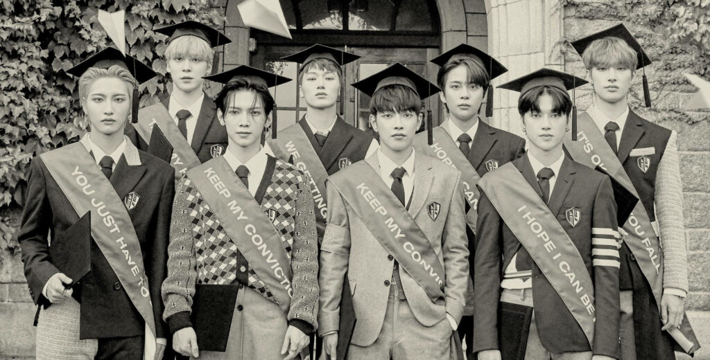ATEEZ Graduation Wallpaper: Elegant Celebration with Caps & Sashes