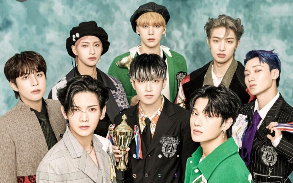 ATEEZ Stylish Wallpaper: Members with Trophy on Turquoise Background
