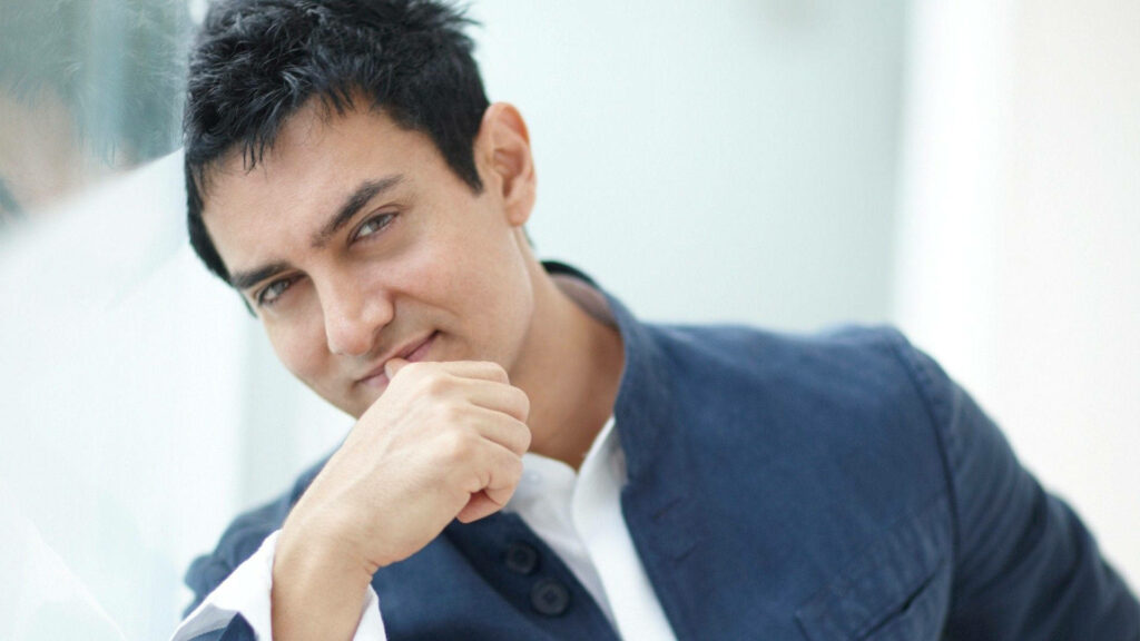 Aamir Khan confident and stylish thoughtful expression wallpaper background of acclaimed actor