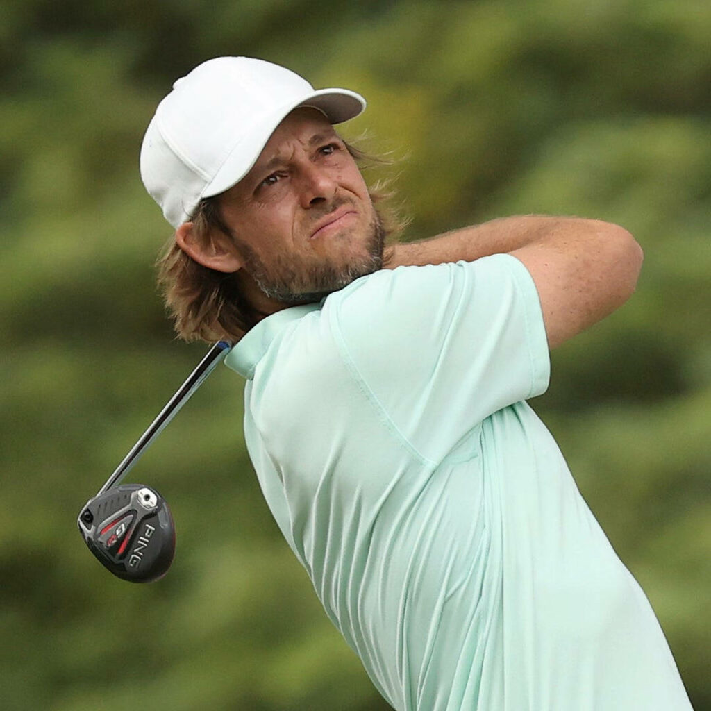 Aaron Baddeley swinging driver on golf course showing skill and focus professional golfer Wallpaper