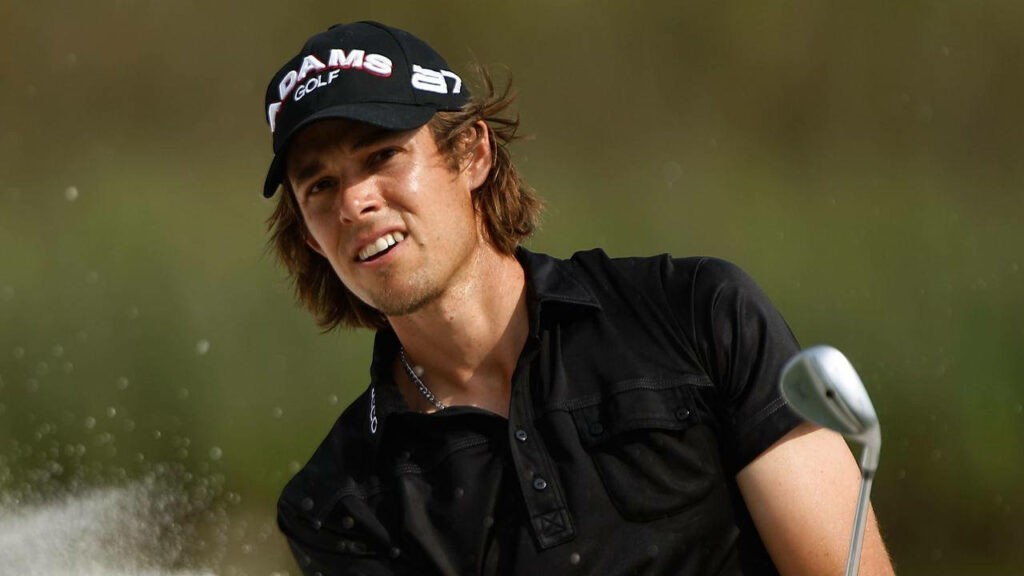 Aaron Baddeley mid-swing on PGA Tour golf course showcasing focus and athleticism wallpaper
