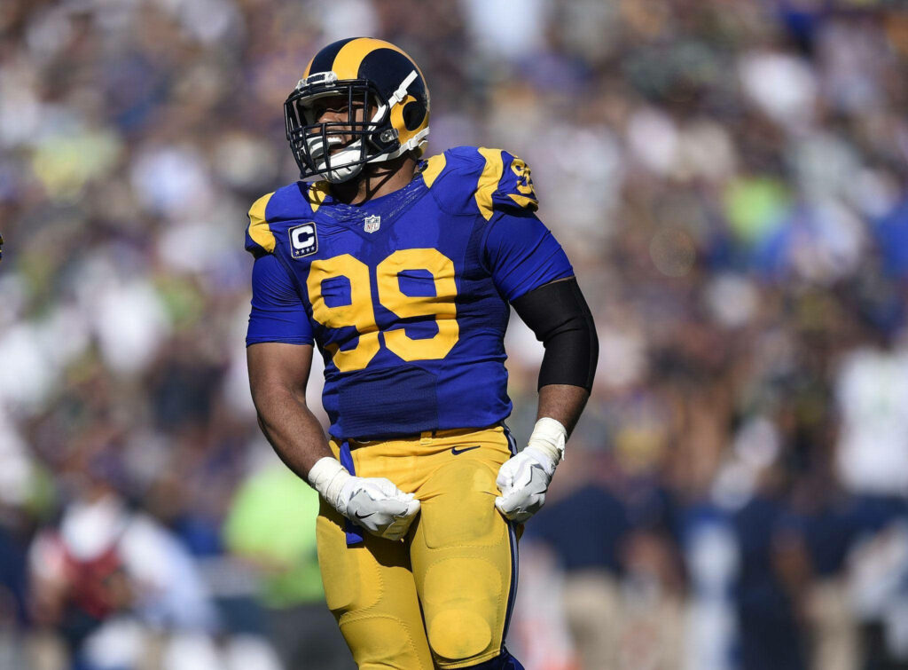 Aaron Donald in Los Angeles Rams uniform intense pose NFL best defensive end wallpaper background