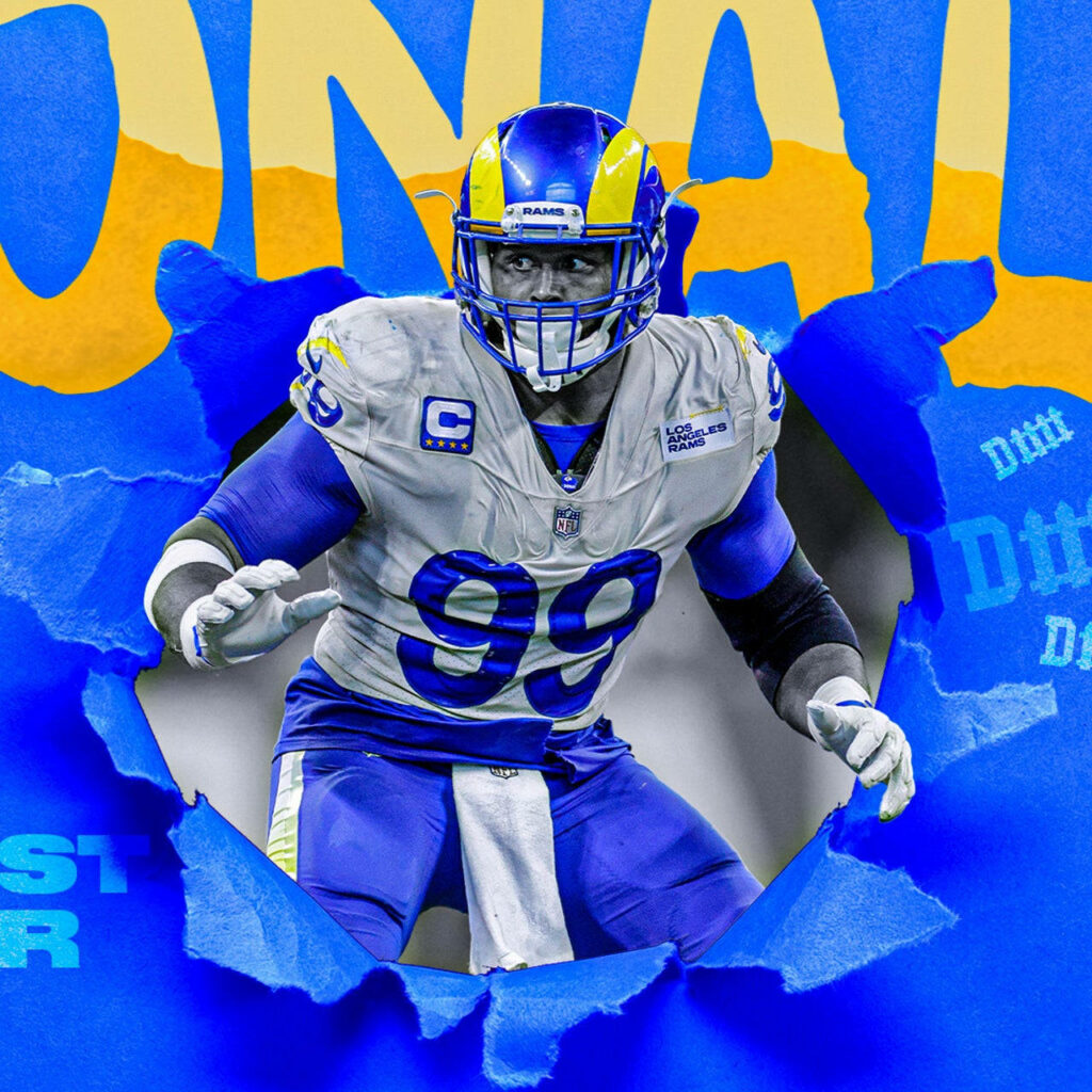 Aaron Donald Los Angeles Rams Super Bowl poster bursting through vibrant blue and yellow background Wallpaper