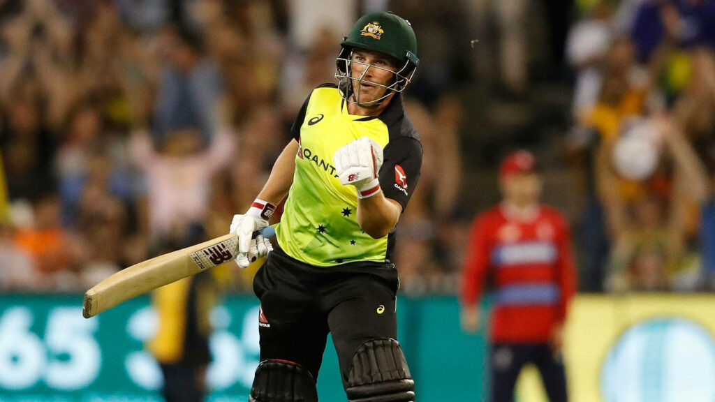 Aaron Finch dynamic cricket batting action vibrant in-game wallpaper background image