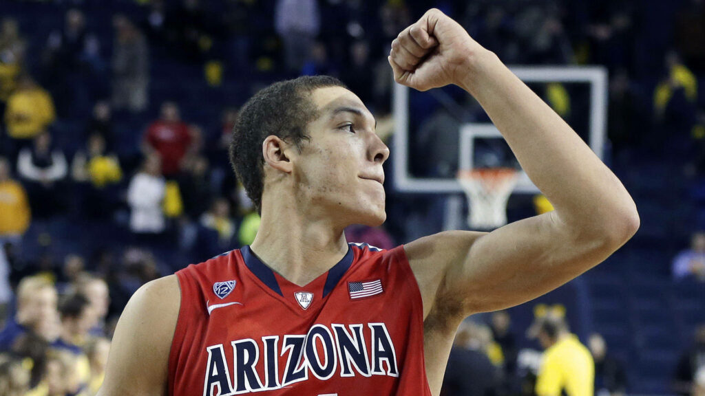 Aaron Gordon celebrates on court in Arizona jersey dynamic basketball MVP star wallpaper background