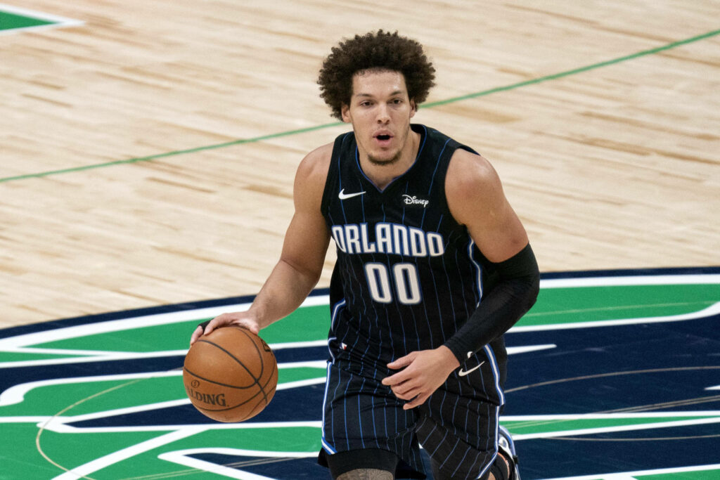 Aaron Gordon Orlando Magic basketball action wallpaper showing intense focus and athleticism