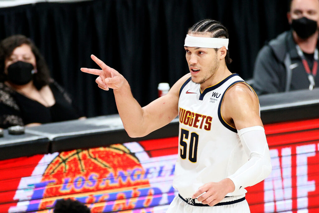 Denver Nuggets forward Aaron Gordon in number 50 jersey making gesture during basketball game Wallpaper