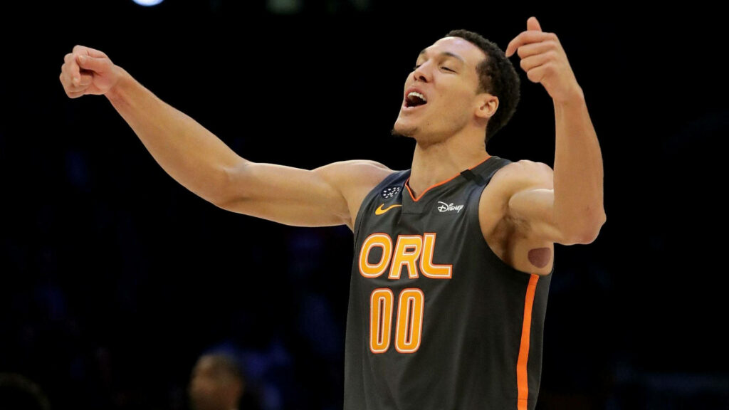 Aaron Gordon Orlando Magic celebrates on court dynamic NBA moment basketball wallpaper background