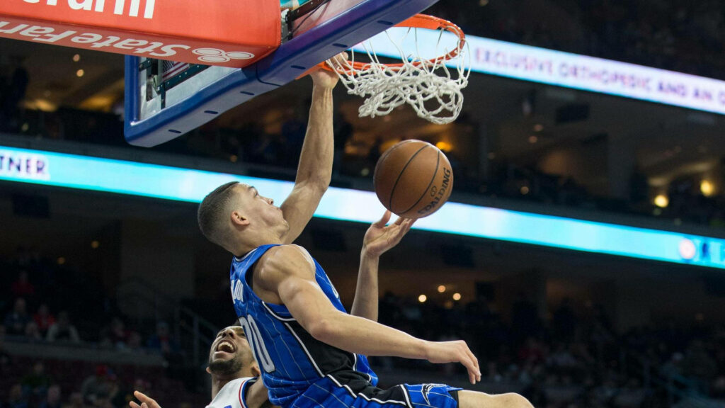 Aaron Gordon NBA power forward soars for a dunk dynamic basketball action wallpaper background