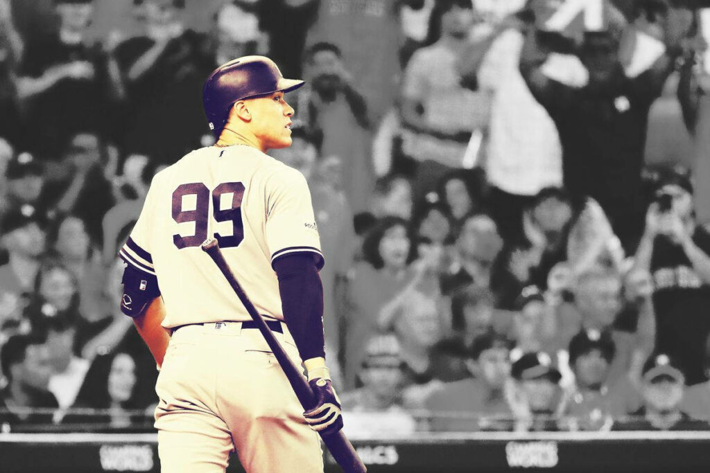Aaron Judge in number 99 jersey ready to bat before cheering crowd baseball wallpaper background
