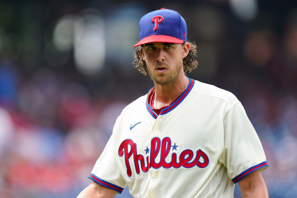 Aaron Nola in Philadelphia Phillies uniform focused intense glare showing determination wallpaper