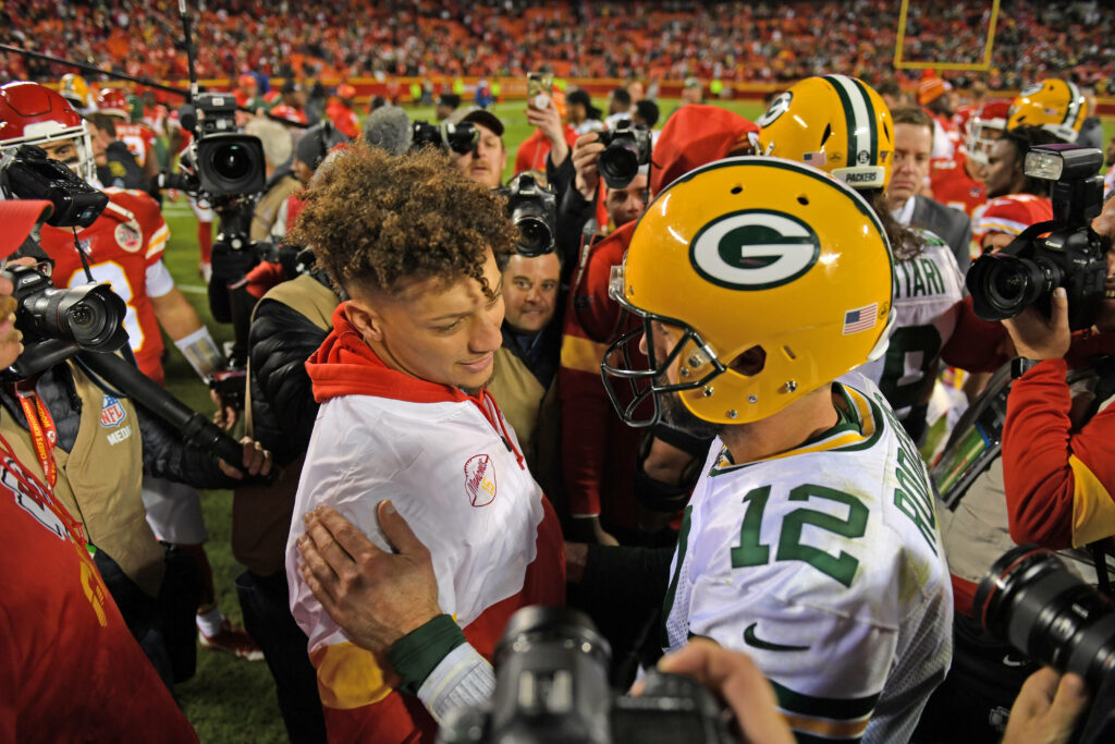Aaron Rodgers and Patrick Mahomes share a respectful moment on the NFL field after the game wallpaper
