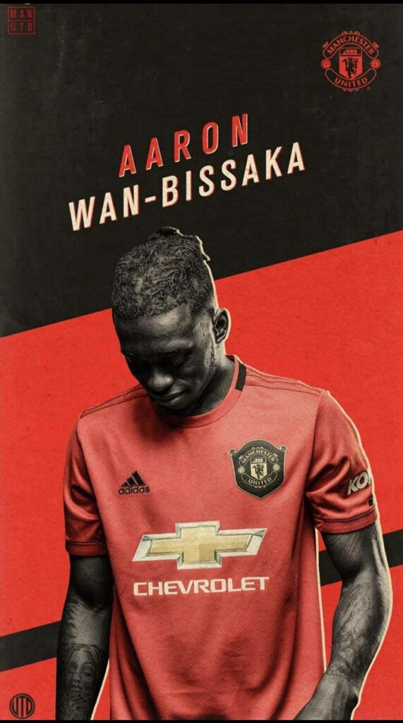 Aaron Wan Bissaka Manchester United wallpaper black red background club branding pose