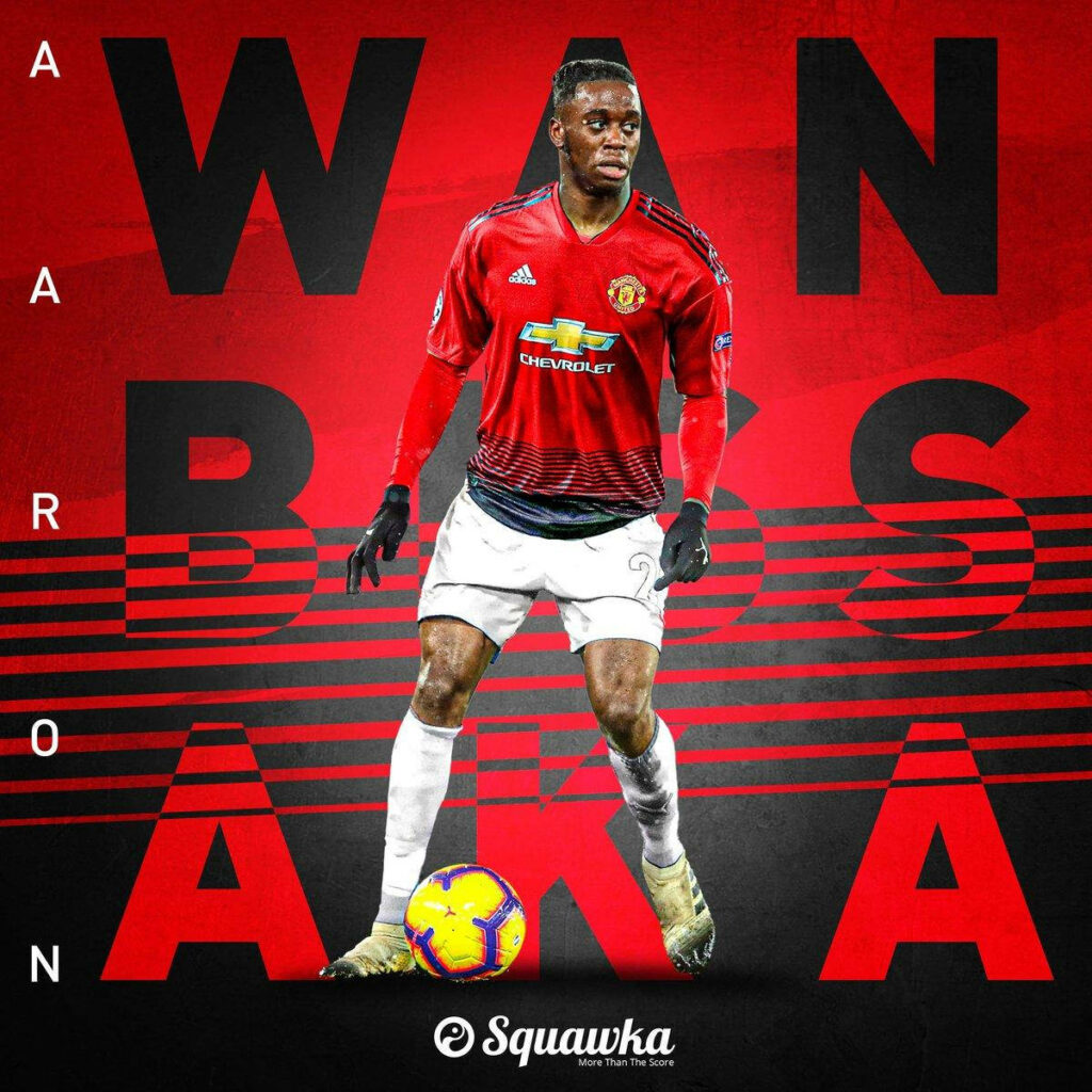 Aaron Wan-Bissaka in Manchester United kit with Chevrolet logo on bold red and black background Wallpaper