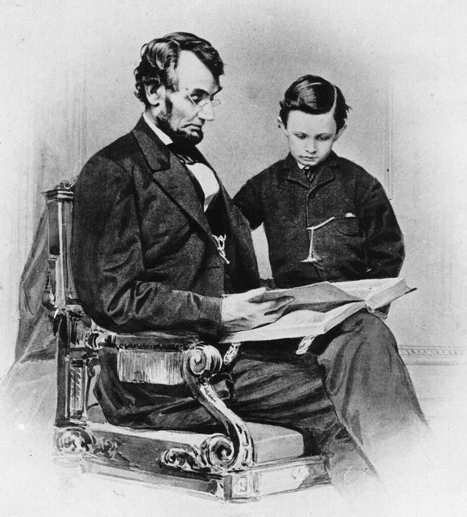 Abraham Lincoln reading in chair with son Tad standing beside him quiet intimate moment wallpaper